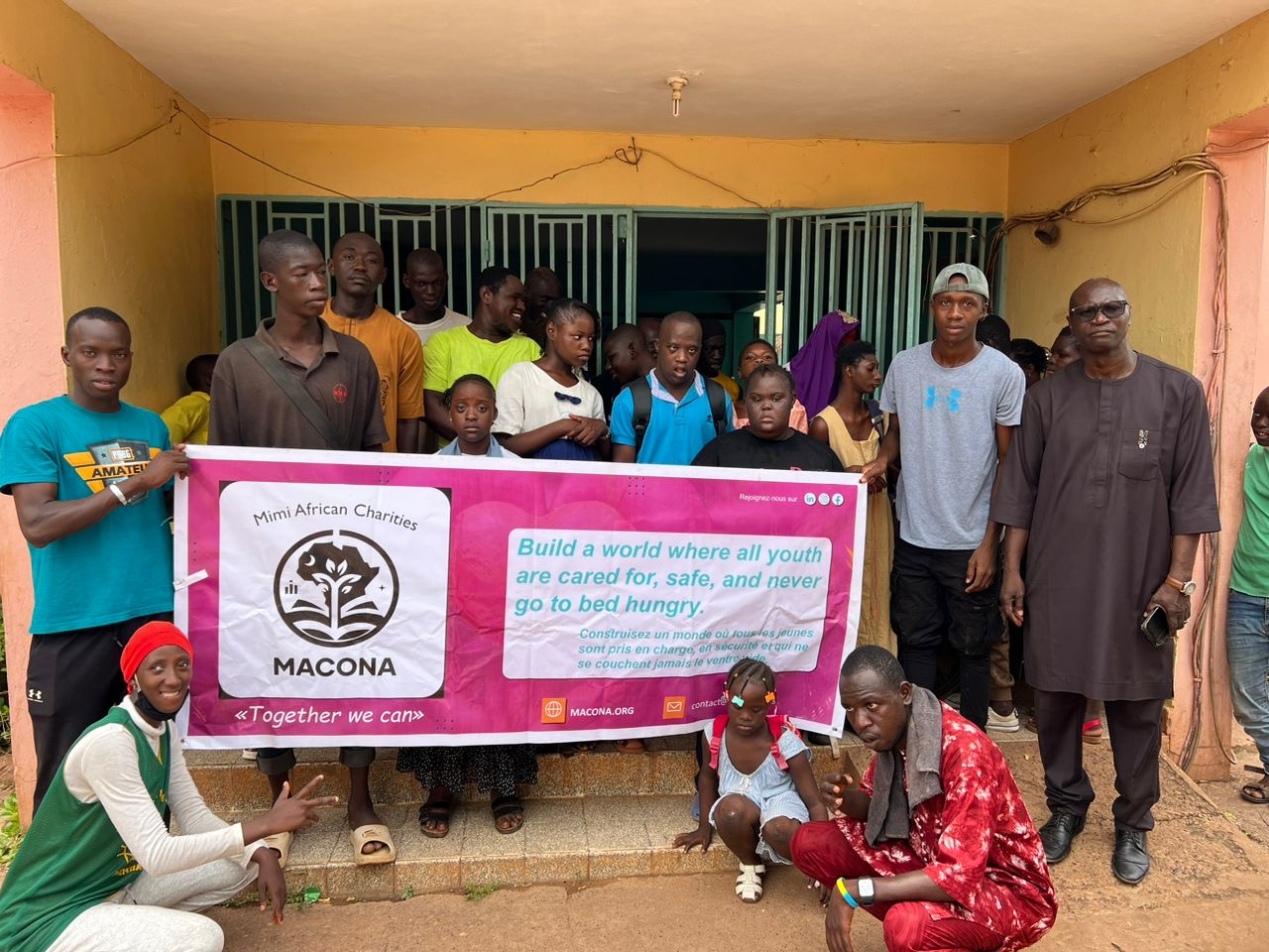 MACONA volunteers and community gathered at a special-needs home in Africa