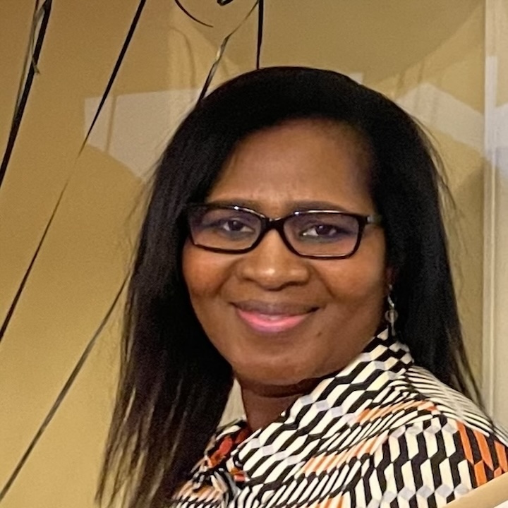 Mariam Williams smiling at the camera