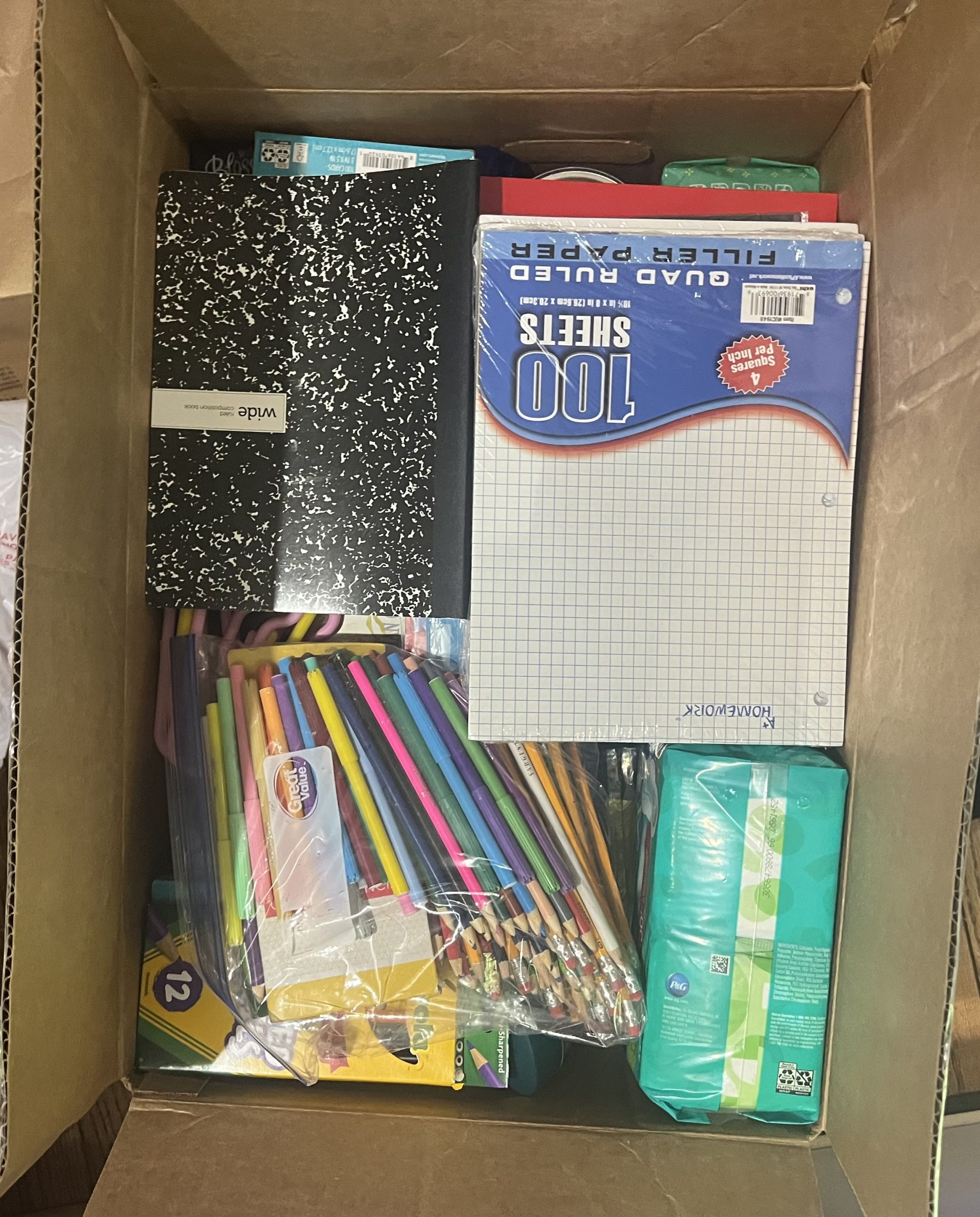 Group photo of Atholton High School class with their collected donations