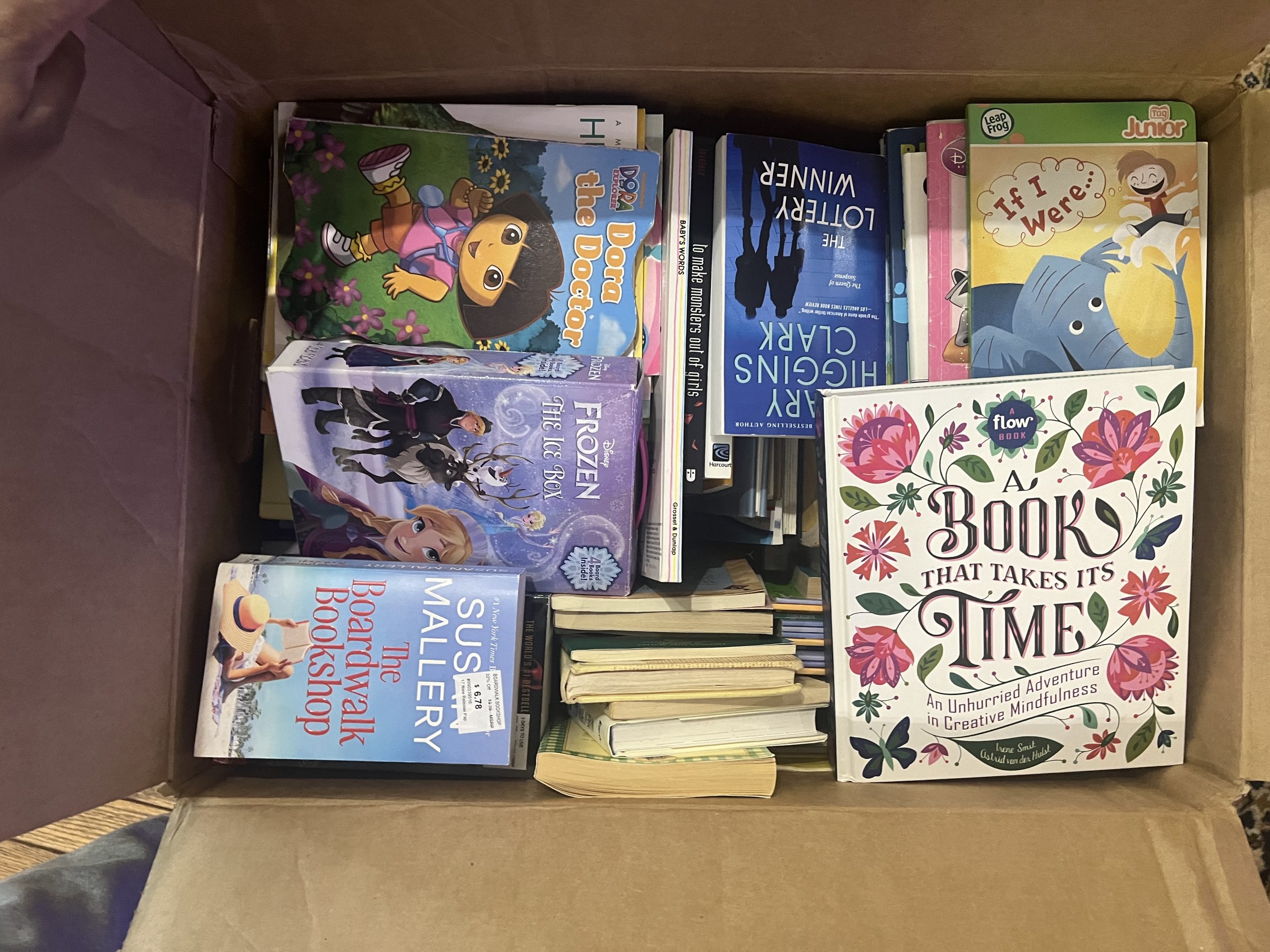 Boxes of donated clothing, shoes, books, and supplies collected by Atholton High School students